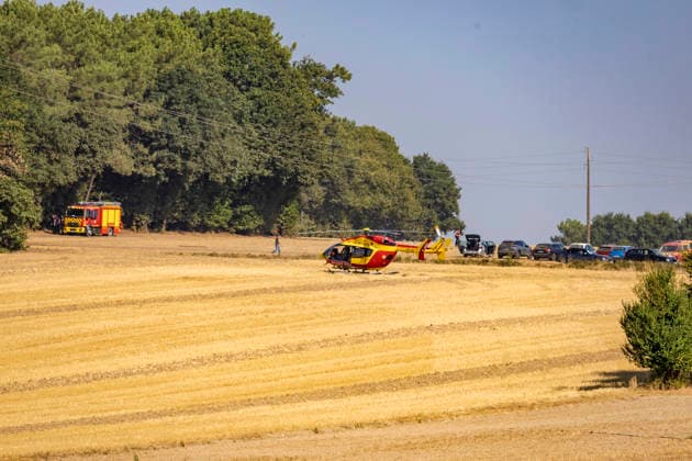 Forest Fire Aftermath In Saint-Just - France Firefighting vehicles from the Ille-et-Vilaine department and a civil security helicopter are deployed during a forest fire in the Saint-Just area on August 13, 2026, as emergency crews battle the blaze. Photo by La Tuque Jaune ANDBZ ABACAPRESS.COM Saint-Just Ille-et-Vilaine France  Copyright: xANDBZ ABACAx
