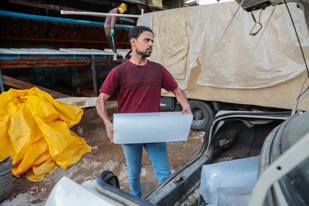 Heat wave affects Iraq causing an increase in demand for ice BAGHDAD, IRAQ - AUGUST 13 : People queue and buy ice blocks at production centers and retail points as a heatwave sweeping across Iraq, prompts residents to rely on ice to cool down and maintain daily life amid above-normal seasonal temperatures on August 13, 2026 in Baghdad, Iraq. Murtadha Al-Sudani Anadolu Baghdad Iraq. Editorial use only. Please get in touch for any other usage.  Copyright: x2026xAnadoluxMurtadhaxAl-Sudanix