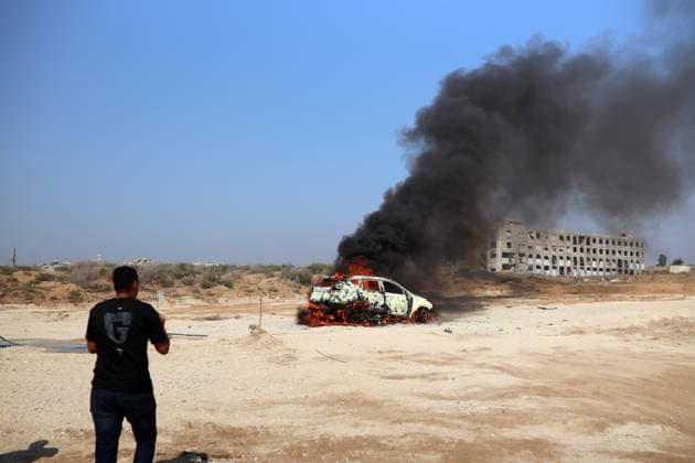 Aftermath Of Israeli Airstrike In Gaza, Palestine A car burns following an Israeli airstrike in Gaza City, Gaza, on August 13, 2026. Gaza Palestine  Copyright: xMajdixFathix originalFilename: fathi-notitle260813_npCIz.jpg