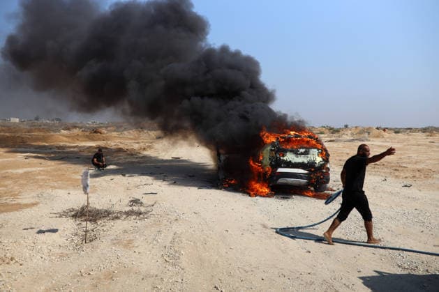 Aftermath Of Israeli Airstrike In Gaza, Palestine A car burns following an Israeli airstrike in Gaza City, Gaza, on August 13, 2026. Gaza Palestine  Copyright: xMajdixFathix originalFilename: fathi-notitle260813_npyfJ.jpg