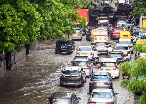 Heavy rain lashes parts of the National Capital New Delhi, Aug 13 (ANI): Commuters wade through a waterlogged road near SIR M. Vishweshwariah Moti Bagh metro station following heavy rainfall, in New Delhi on Thursday. New Delhi Delhi India Copyright: xANIx ANI_20260813278