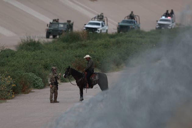 Mexican and US forces conduct joint binational security exercise along border EL PASO, TEXAS, US - AUGUST 13: Mexican and US military and law enforcement personnel take part in a joint binational security exercise along the border between Ciudad Juarez, Mexico, and El Paso, Texas, United States on August 13, 2026. The bilateral operation featured simultaneous deployments on both sides of the Rio Grande, incorporating specialized tactical units and low-flying helicopters to demonstrate rapid-response capabilities and strategic coordination against potential border threats. Christian Torres Anadolu Texas United States. Editorial use only. Please get in touch for any other usage.  Copyright: x2026xAnadoluxChristianxTorresx