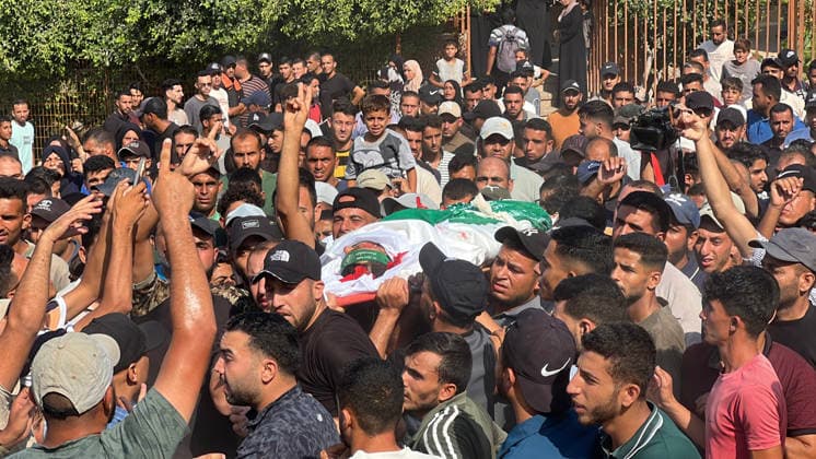 Mourners carry the body of Huthaifa Kawara during his funeral at Nasser Hospital in Khan Younis, Gaza, Palestine, on August 13, 2026. Kawara, a field commander of the Izz al-Din al-Qassam Brigades, Hamas s military wing, was killed in an Israeli airstrike in Khan Younis. Israel also assassinated the Gaza City police chief.  GAZ2026081306 SaidxAbid