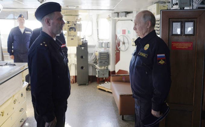 August 13, 2026, Korsakov, Sakhalin Oblast, Russia: Russian President Vladimir Putin, right, speaks with a ships officer during a visit to the Russian Navy Slava-class missile cruiser RF Varyag, August 12, 2026 off the coast of Sakhalin Island, Russia. Putin is in the Far East to observe the Pacific Fleet naval exercises. Korsakov Russia - ZUMAp138 20260813_zaa_p138_003 Copyright: xGavriilxGrigorov RussianxGovernmx