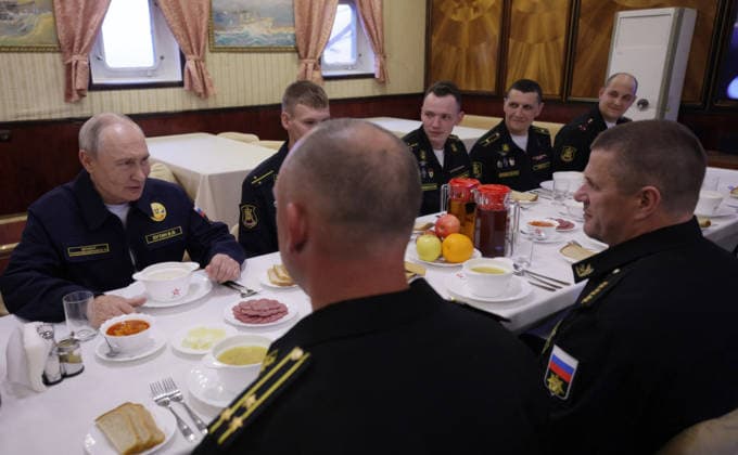 August 13, 2026, Korsakov, Sakhalin Oblast, Russia: Russian President Vladimir Putin, left, joins naval officers for lunch aboard the Russian Navy Slava-class missile cruiser RF Varyag, August 12, 2026 in Korsakov, Sakhalin Oblast, Russia. Putin is visiting the remote island in the Russian Far East to view the Pacific Fleet naval exercises. Korsakov Russia - ZUMAp138 20260813_zaa_p138_015 Copyright: xGavriilxGrigorov RussianxGovernmx
