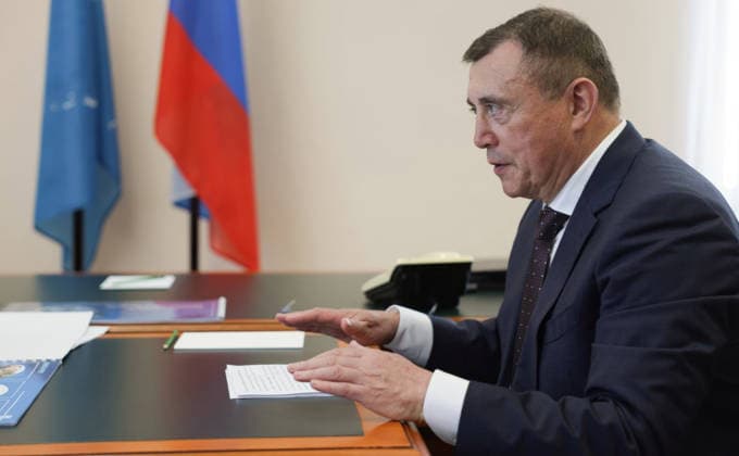 August 13, 2026, Kurilsk, Sakhalin Oblast, Russia: Sakhalin Region Governor Valery Limarenko delivers his report to Russian President Vladimir Putin, during a working meeting, August 13, 2026 in Kurilsk, Sakhalin Oblast, Russia. Kurilsk Russia - ZUMAp138 20260813_zaa_p138_017 Copyright: xGavriilxGrigorov RussianxGovernmx