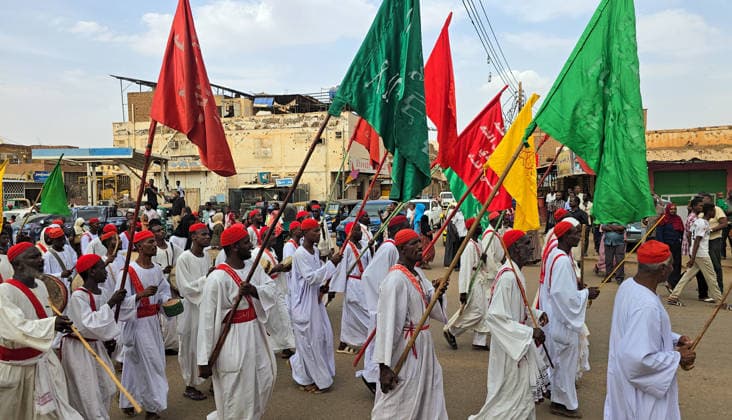 Traditional Prophet s Procession in Sudan KHARTOUM, SUDAN - AUGUST 13: People take part in Prophet s Procession march, which was held ahead of the anniversary of the Prophet Muhammad s birth, one of the country s deep-rooted traditions, in Khartoum, Sudan on August 13, 2026. Sufi groups performed devotional chants and hymns during the procession. Nezar Abdallah Basheer Anadolu Khartoum Sudan. Editorial use only. Please get in touch for any other usage.  Copyright: x2026xAnadoluxNezarxAbdallahxBasheerx