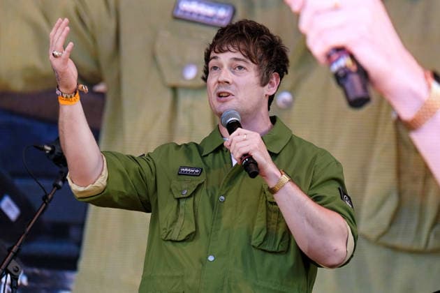 August 13, 2026, Williamscot, Oxfordshire, United Kingdom: British stand up comedian and compere Matt Bragg performs live on stage at Fairport s Cropredy Convention. Matt Bragg is the son of television warm up act Bobby Bragg, He has supported comedians Ricky Gervais, Harry Hill, Lloyd Griffith, Jason Manford and John Bishop. He was runner up in Leicester Mercury™s Comedian of The Year 2020. He is based in the midlands. Williamscot United Kingdom - ZUMAs197 20260813_aaa_s197_190 Copyright: xDawnxFletcher-Parkx