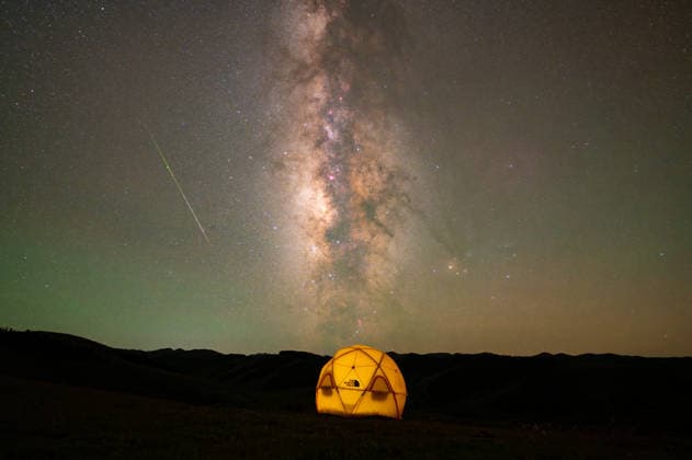 (260814) -- BEIJING, Aug. 14, 2026 -- This photo taken on Aug. 12, 2026 shows Perseid meteor shower over Jiangrong Township of Hongyuan County, southwest China s Sichuan Province. Perseid meteor shower, which peaks on August 12 and 13 this year, is an annual meteor shower that occurs from mid-July to late August. (Photo by Xinhua) XINHUA PHOTOS OF THE DAY YangxChangjin 