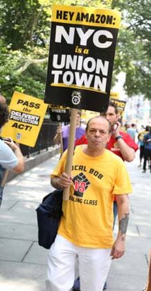 August 13, 2026, New York, New York, USA: Amazon Teamsters and Allies picket outside of City Hall for passage of the Delivery Protection Act. The Delivery Protection Act would require companies like Amazon to hire its workforce directly, essentially making AmazonÃ¢â‚¬â ¢s corrupt third-party Delivery Service Partner model illegal in New York City. New York USA  - ZUMAk03_ 20260813_zaf_k03_056 Copyright: xNancyxKaszermanx