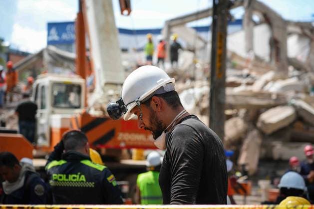 (260814) -- CALI, Aug. 14, 2026 -- Rescuers work amid the rubble in Cali, Colombia, Aug. 13, 2026. The death toll from Monday s 7.4-magnitude earthquake in Colombia has risen to 281, according to the country s National Unit for Disaster Risk Management. (Photo by Xinhua) COLOMBIA-CALI-EARTHQUAKE-SEARCH AND RESCUE AndresxMoreno 