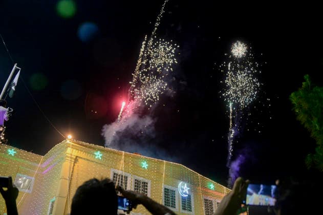 Pakistan Independence Day Celebrations Rawalpindi Fireworks rise above an illuminated building as people watch during Independence Day celebrations in Rawalpindi, Pakistan, on August 13, 2026. Pakistan marks Independence Day on August 14, commemorating the countryis independence from British rule in 1947. Rawalpindi Punjab Pakistan Copyright: xZubairxAbbasix