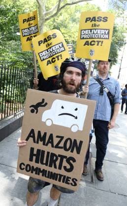 August 13, 2026, New York, New York, USA: Amazon Teamsters and Allies picket outside of City Hall for passage of the Delivery Protection Act. The Delivery Protection Act would require companies like Amazon to hire its workforce directly, essentially making Amazon s corrupt third-party Delivery Service Partner model illegal in New York City. New York USA  - ZUMAk03_ 20260813_zaf_k03_064 Copyright: xNancyxKaszermanx