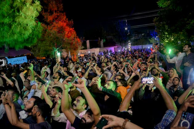 Pakistan Independence Day Celebrations Rawalpindi People raise their hands and smartphones during Independence Day celebrations in Rawalpindi, Pakistan, on August 14, 2026. Pakistan marks Independence Day on August 14, commemorating the countryis independence from British rule in 1947. Rawalpindi Punjab Pakistan Copyright: xZubairxAbbasix