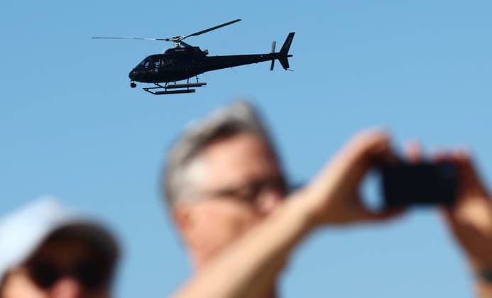PACIFIC AIRSHOW, A helicopor hovers over spectators during The Pacific Airshow Gold Coast in Surfers Paradise, Queensland, Friday, August 14, 2026. ( NO ARCHIVING Surfers Paradise Queensland AUSTRALIA  Copyright: xx 20260814121789022396