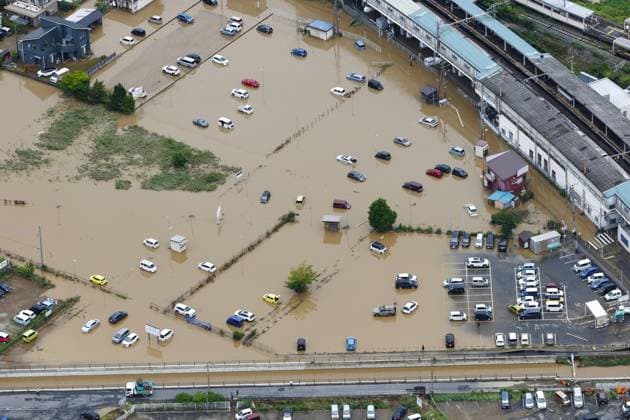 Aftermath of torrential rain in eastern Japan Photo taken from a Kyodo News helicopter on Aug. 14, 2026, shows a flooded parking lot in Oamishirasato, Chiba Prefecture, east of Tokyo, after torrential rain overnight. Japan s weather agency issued its highest Level 5 warning for downpours in parts of the prefecture.  A14AA0005625745P
