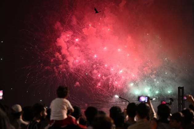 (260814) -- ISLAMABAD, Aug. 14, 2026 -- People watch fireworks set off to celebrate Pakistan s Independence Day in Islamabad, capital of Pakistan, on Aug. 14, 2026. ) PAKISTAN-ISLAMABAD-INDEPENDENCE DAY-FIREWORKS AhmadxKamal 
