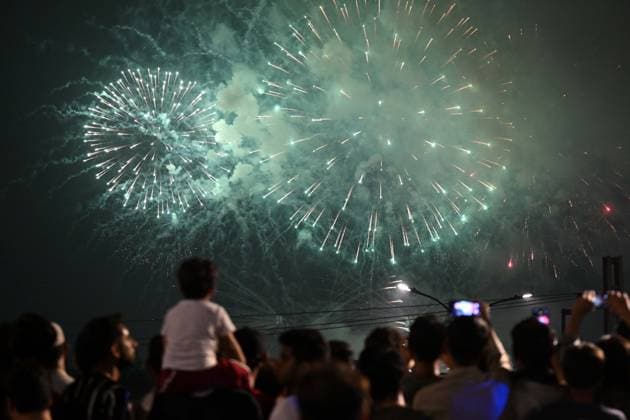 (260814) -- ISLAMABAD, Aug. 14, 2026 -- People watch fireworks set off to celebrate Pakistan s Independence Day in Islamabad, capital of Pakistan, on Aug. 14, 2026. ) PAKISTAN-ISLAMABAD-INDEPENDENCE DAY-FIREWORKS AhmadxKamal 