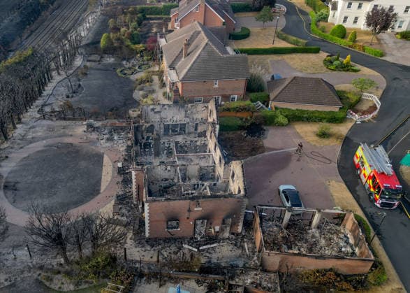 August 14, 2026, Stourbridge, West Midlands, UK: Stourbridge, UK. Damaged caused to homes in the Stourbridge area of Birmingham, West Midlands, after fires broke out yesterday afternoon in record temperatures. The UK experienced its hottest day of the year on Thursday, with a peak of 38.1 degrees celsius recorded at Kew Gardens. Stourbridge UK  - ZUMAl94_ 20260814_zaf_l94_003 Copyright: xIoannisxAlexopoulosx