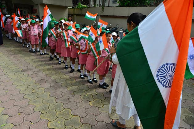 August 14, 2026, Siliguri, West Bengal, India: School children from Bright Academy preparatory school, along with their teachers and staff, wave Indian National flags while taking part in the Tiranga Yatra in Siliguri, on the eve of India s Independence Day celebrations. Siliguri India - ZUMAd209 20260814_znp_d209_007 Copyright: xDiptenduxDuttax