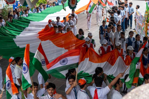 August 14, 2026, New Delhi, Delhi, India: Students and teachers take part in a Tiranga Yatra as a Delhi school celebrates IndiaÃ¢â‚¬â ¢s 80th Independence Day in New Delhi. Students carry a 100 foot long Indian national flag during the procession, promoting a message of unity, solidarity and national pride. New Delhi India - ZUMAt180 20260814_zip_t180_002 Copyright: xJaixThakurx