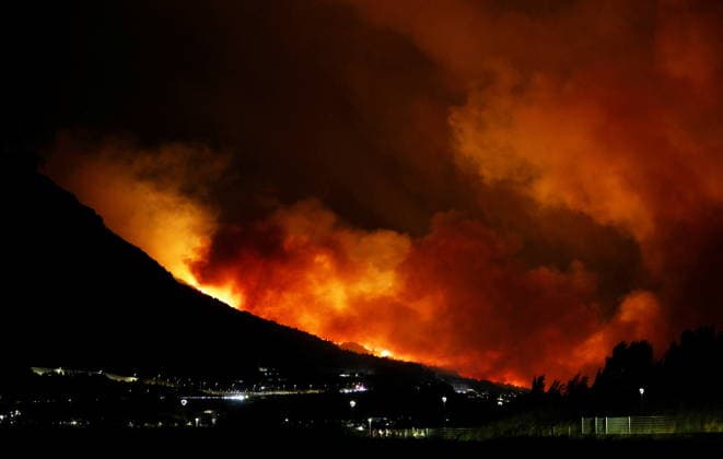 RECORD DATE NOT STATED Omis, Croatia, 140826. A large fire broke out last night in Lokva Rogoznica and spread to the area above Omis. Houses and cars were burned. Traffic on the Adriatic Highway was disrupted, residents and tourists from the affected area were evacuated, and firefighters are on the ground extinguishing the fire, which is being made more difficult by strong winds. Photo: Jakov Prkic CROPIX CROATIA Copyright: xxJakovxPrkicx xCROPIXx pozar_omis1-130826