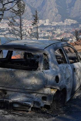 Omis, Croatia, 140826. A large fire broke out last night in Lokva Rogoznica and spread to the area above Omis. Houses and cars were burned. Traffic on the Adriatic Highway was disrupted, residents and tourists from the affected area were evacuated, and firefighters are on the ground extinguishing the fire, which is being made more difficult by strong winds. Photo: Josko Ponos CROPIX Split CROATIA Copyright: xxJoskoxPonosx xCROPIXx jp-pozar_omis83-140826