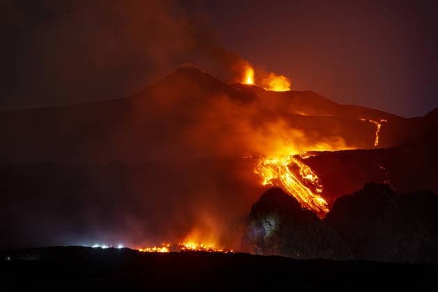Mount Etna s eruptive activity continues CATANIA, ITALY - AUGUST 14: Mount Etna s eruptive activity continues, with active lava flows fed by vents located at 2,750 and 1,900 meters of altitude, alongside ongoing ash emissions from the Voragine summit crater in Catania, Sicily, Italy on August 14, 2026. The spectacular glowing lava streams have attracted an exceptional influx of hikers, tourists, and curious onlookers eager to witness the volcanic phenomenon at night. In response to this dangerous mass exodus towards the active lava fronts, local authorities have implemented strict roadblocks, parking bans along key mountain routes like the Mareneve road, and restricted access to the affected areas to ensure public safety. Meanwhile, the con  Copyright: x2026xAnadoluxSalvatorexAllegrax