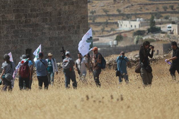 Israeli violations against Palestinians continue HEBRON, WEST BANK, PALESTINE - AUGUST 14: Palestinians and foreign activists gather to protest in support of their land, which they say is under threat of being seized by Israelis, and to express their determination not to leave their properties in Beit Sahour, Hebron Governorate, West Bank, on August 14, 2026. Armed Israelis who came to the area intervened and attempted to disperse the group. Mamoun Wazwaz Anadolu Hebron West Bank. Editorial use only. Please get in touch for any other usage.  Copyright: x2026xAnadoluxMamounxWazwazx