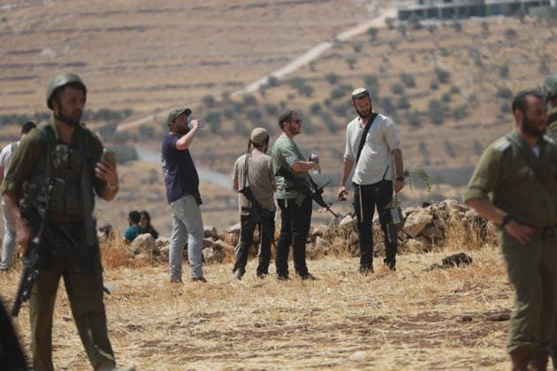Israeli violations against Palestinians continue HEBRON, WEST BANK, PALESTINE - AUGUST 14: Palestinians and foreign activists gather to protest in support of their land, which they say is under threat of being seized by Israelis, and to express their determination not to leave their properties in Beit Sahour, Hebron Governorate, West Bank, on August 14, 2026. Armed Israelis who came to the area intervened and attempted to disperse the group. Mamoun Wazwaz Anadolu Hebron West Bank. Editorial use only. Please get in touch for any other usage.  Copyright: x2026xAnadoluxMamounxWazwazx