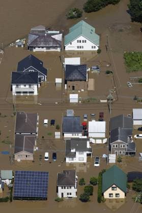Aftermath of torrential rain in eastern Japan Photo taken from a Kyodo News helicopter shows a residential area submerged in floodwater in Oamishirasato in Chiba Prefecture, east of Tokyo, on Aug. 14, 2026, after torrential rain overnight.  A14AA0005625811P