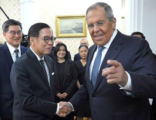 Russia Thailand 9221974 14.08.2026 Russian Foreign Minister Sergey Lavrov, right, and Thai Deputy Prime Minister and Foreign Minister Sihasak Phuangketkeow shake hands as they pose for photos during a meeting in Moscow, Russia. Sergey Guneev Sputnik Moscow Russia  Copyright: xSergeyxGuneevx