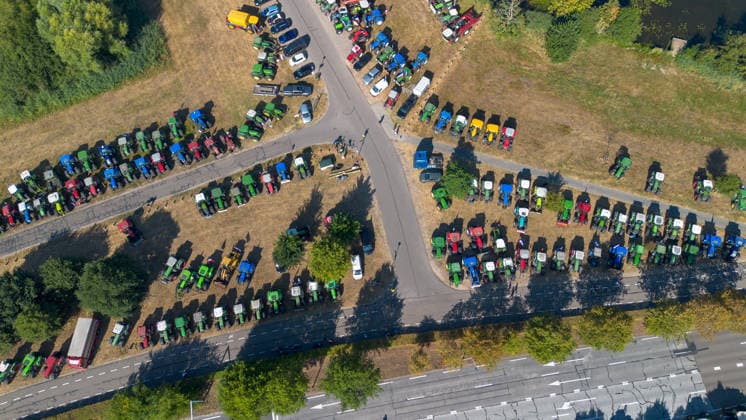 Dutch farmers gather in Den Bosch to demonstrate against agricultural policies DEN BOSCH, NETHERLANDS - AUGUST 14: An aerial view of tractors as farmers gather in Den Bosch ( s-Hertogenbosch) to take part in a demonstration over agricultural policies and regulations affecting the farming sector in Netherlands, on August 14, 2026. Hundreds of agricultural workers assembled with tractors, banners, and flags to protest provincial plans to revoke nature and nitrogen permits for local poultry farmers, raising broader concerns over legal certainty and regulations affecting the agricultural sector. Mouneb Taim Anadolu Den Bosch Netherlands. Editorial use only. Please get in touch for any other usage.  Copyright: x2026xAnadoluxMounebxTaimx