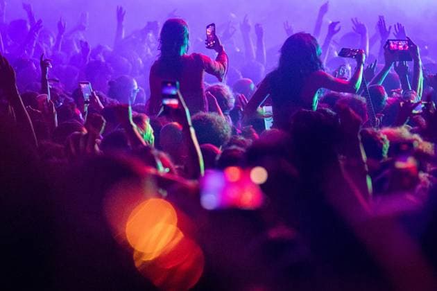Underworld — Vodafone Paredes de Coura 2026 in Portugal - 14 Aug Festival goers dance and raise their hands during the performance of Underworld at Vodafone Paredes de Coura. Paredes de Coura Portugal Copyright: xDiogoxBaptistax xSOPAxImagesx DB_Underworld20260813PDC_018