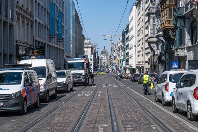 Emergency services pictured on the site of an explosion at the Treurenberg in the city center of Brussels, Friday 14 August 2026. According to the first information, two explosion happened in a building which was evacuated earlier in the day after a gas leak was detected, injuring two people.  EMILExWINDAL 1081058046st