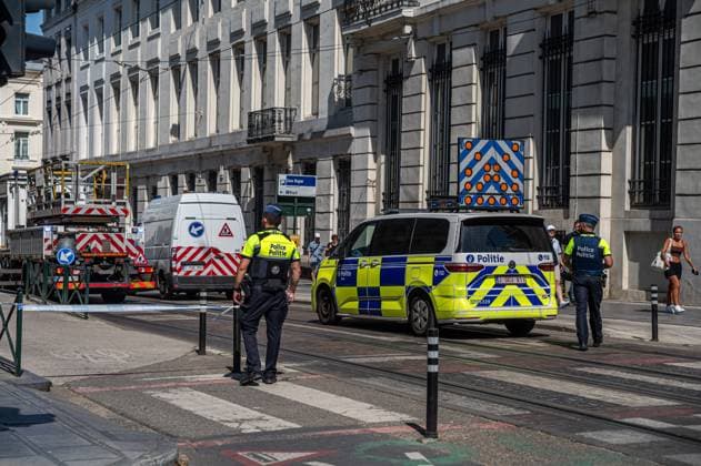 Emergency services pictured on the site of an explosion at the Treurenberg in the city center of Brussels, Friday 14 August 2026. According to the first information, two explosion happened in a building which was evacuated earlier in the day after a gas leak was detected, injuring two people.  EMILExWINDAL 1081058062st