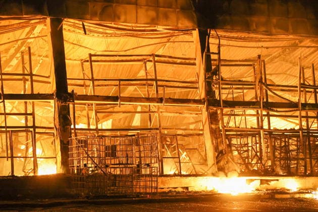 RUSSIA, DONETSK PEOPLE S REPUBLIC - AUGUST 14, 2026: A fire breaks out after a Ukrainian drone strike on the Galaktika Galaxy shopping centre in Yenakiyevo, northeast of Donetsk. Dmitry Yagodkin TASS  96146247