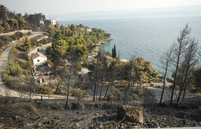 Aftermath of wildfire near Croatia s Omis OMIS, CROATIA - AUGUST 14: An aftermath view of wildfire near Omis, Croatia on August 14, 2026. Samir Jordamovic Anadolu Omis Croatia. Editorial use only. Please get in touch for any other usage.  Copyright: x2026xAnadoluxSamirxJordamovicx
