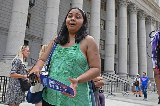 August 14, 2026, New York, New York, USA: August 14, 2026 - New York, NY, USA - Mangione supporter seen after Luigi Mangione enters an open guilty plea in federal court, admitting to all charges without any accommodations. He faces a maximum penalty of life in prison for the assassination of United Healthcare CEO, Brian Thompson on a Manhattan street. (Andrea RENAULT Zuma Press) New York USA - ZUMAg115 20260814_faf_g115_003 Copyright: xAndreaxRenaultx