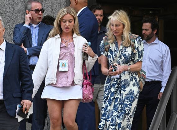 August 14, 2026, New York, New York, USA: August 14, 2026 - New York, NY, USA - Mangione supporter-in pink - seen after Luigi Mangione enters an open guilty plea in federal court, admitting to all charges without any accommodations. He faces a maximum penalty of life in prison for the assassination of United Healthcare CEO, Brian Thompson on a Manhattan street. (Andrea RENAULT Zuma Press) New York USA  - ZUMAg115 20260814_faf_g115_011 Copyright: xAndreaxRenaultx