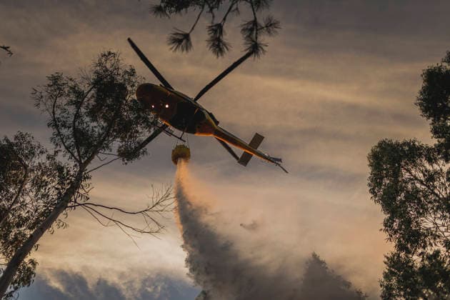 An active wildfire has burned 20 hectares in Lousame, A Coruna. A helicopter is assisting with firefighting efforts on August 14, 2026, in Lousame, A Coruna, Galicia, Spain. The Regional Ministry of Rural Affairs has reported an active wildfire that has already burned approximately 20 hectares in the municipality of Lousame, in A Coruna. Specifically, according to the regional government, the fire broke out around 5:30 p.m. in the parish of Lesende and, according to preliminary estimates, it has affected about 20 hectares. To extinguish the fire, two technicians, nine firefighters, 13 firefighting crews, eight motorized pumps, three backhoes, nine helicopters, and four airplanes—including resources from the BRIF in Laza. AUGUST 14, 2026 FI  Copyright: xAgostimex 7714674
