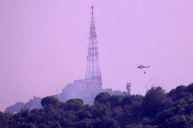 Forest Fire In The Upper Part Of Barcelona Firefighters deployed 10 fire engines and four helicopters and brought the fire under control after four hours of work in Barcelona, Spain, on August 14, 2026. More than 500 wildfires have been recorded in Catalonia this summer. One of the latest broke out in the Collserola mountain range, near a telecommunications tower overlooking Barcelona. The blaze burned 10 hectares and threatened populated areas, prompting authorities to order residents in Barcelona s upper neighborhoods to remain indoors Barcelona Barcelona Spain  Copyright: xUrbanandsportx originalFilename: urbanandsport-forestfi260814_npfdM.jpg