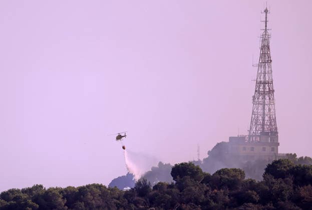 Forest Fire In The Upper Part Of Barcelona Firefighters deployed 10 fire engines and four helicopters and brought the fire under control after four hours of work in Barcelona, Spain, on August 14, 2026. More than 500 wildfires have been recorded in Catalonia this summer. One of the latest broke out in the Collserola mountain range, near a telecommunications tower overlooking Barcelona. The blaze burned 10 hectares and threatened populated areas, prompting authorities to order residents in Barcelona s upper neighborhoods to remain indoors Barcelona Barcelona Spain  Copyright: xUrbanandsportx originalFilename: urbanandsport-forestfi260814_npSCw.jpg