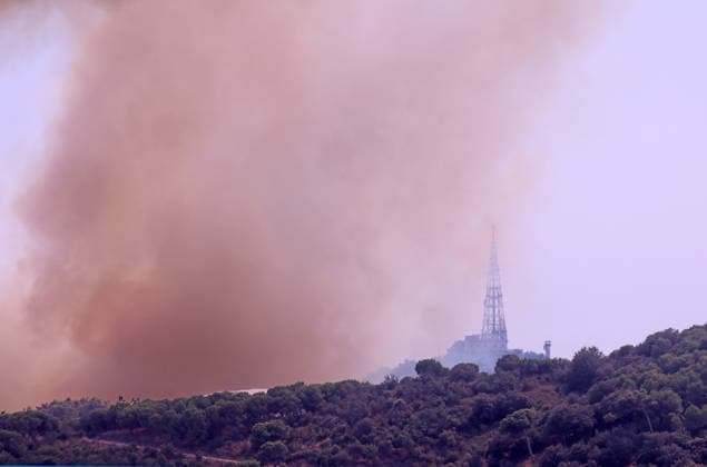 Forest Fire In The Upper Part Of Barcelona Firefighters deployed 10 fire engines and four helicopters and brought the fire under control after four hours of work in Barcelona, Spain, on August 14, 2026. More than 500 wildfires have been recorded in Catalonia this summer. One of the latest broke out in the Collserola mountain range, near a telecommunications tower overlooking Barcelona. The blaze burned 10 hectares and threatened populated areas, prompting authorities to order residents in Barcelona s upper neighborhoods to remain indoors Barcelona Barcelona Spain  Copyright: xUrbanandsportx originalFilename: urbanandsport-forestfi260814_npvIR.jpg