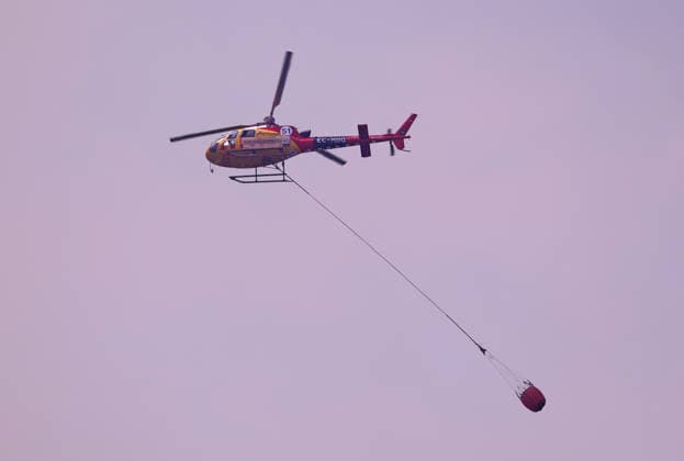 Forest Fire In The Upper Part Of Barcelona Firefighters deployed 10 fire engines and four helicopters and brought the fire under control after four hours of work in Barcelona, Spain, on August 14, 2026. More than 500 wildfires have been recorded in Catalonia this summer. One of the latest broke out in the Collserola mountain range, near a telecommunications tower overlooking Barcelona. The blaze burned 10 hectares and threatened populated areas, prompting authorities to order residents in Barcelona s upper neighborhoods to remain indoors Barcelona Barcelona Spain  Copyright: xUrbanandsportx originalFilename: urbanandsport-forestfi260814_npp5O.jpg