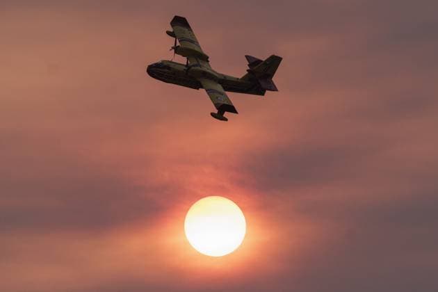 Arjuzanx, The Netherlands, 2026-08-14 20:30:14 Arjuzanx, 14-08-2026, a Security Civil Canadair CL-415 takes off after loading water at the lake next to Arjuzanx to extinguish the forest fire near Luglon. Photo: NLBeeld Robert Meerding Credit: NL Beeld Robert Meerding Inc  Copyright: xx x