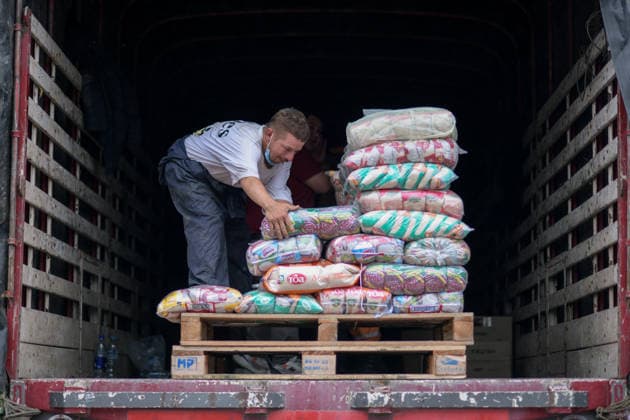 August 14, 2026, Pasto, Narino, Colombia: Humanitarian aid is loaded onto trucks in Pasto, Narino, Colombia, on August 14, 2026, as approximately 100 metric tons of supplies are dispatched from the city to different parts of the country for communities affected by the 7.4 earthquake that struck Colombia on August 10, 2026. Pasto Colombia - ZUMAvp1_ 20260814_zia_vp1_006 Copyright: xCamiloxErassox