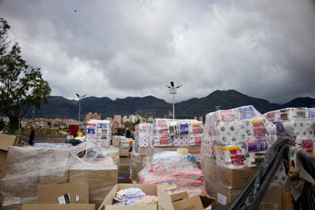 August 14, 2026, Bogota, Bogota D.C, Colombia: People in Bogota, Colombia gather to collect and categorize donations for the victims of the 7,4 earthquake that struck Colombia on August 10 outside El Campin Stadium on August 14, 2026. Bogota Colombia - ZUMAvp1_ 20260814_zia_vp1_016 Copyright: xIsabellaxBobadillax