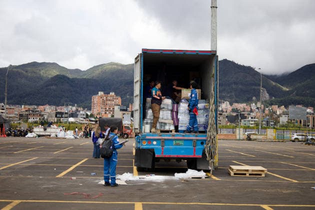 August 14, 2026, Bogota, Bogota D.C, Colombia: People in Bogota, Colombia gather to collect and categorize donations for the victims of the 7,4 earthquake that struck Colombia on August 10 outside El Campin Stadium on August 14, 2026. Bogota Colombia - ZUMAvp1_ 20260814_zia_vp1_018 Copyright: xIsabellaxBobadillax
