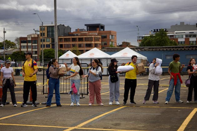 August 14, 2026, Bogota, Bogota D.C, Colombia: People in Bogota, Colombia gather to collect and categorize donations for the victims of the 7,4 earthquake that struck Colombia on August 10 outside El Campin Stadium on August 14, 2026. Bogota Colombia - ZUMAvp1_ 20260814_zia_vp1_032 Copyright: xIsabellaxBobadillax